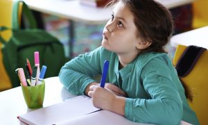 Student listening to teacher